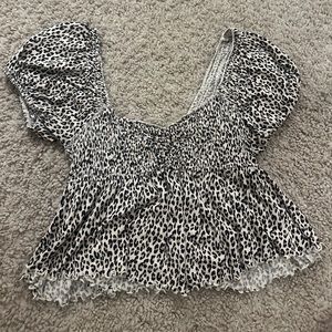 Urban cheetah flowy blouse